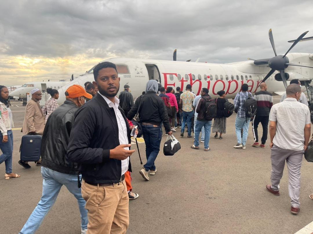 Charis Export team member boarding an Ethiopian Airlines flight
